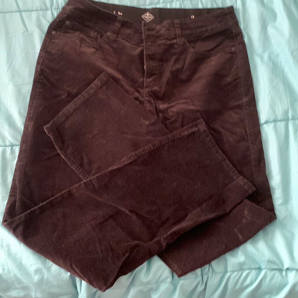 Black corduroy pants, straight leg.